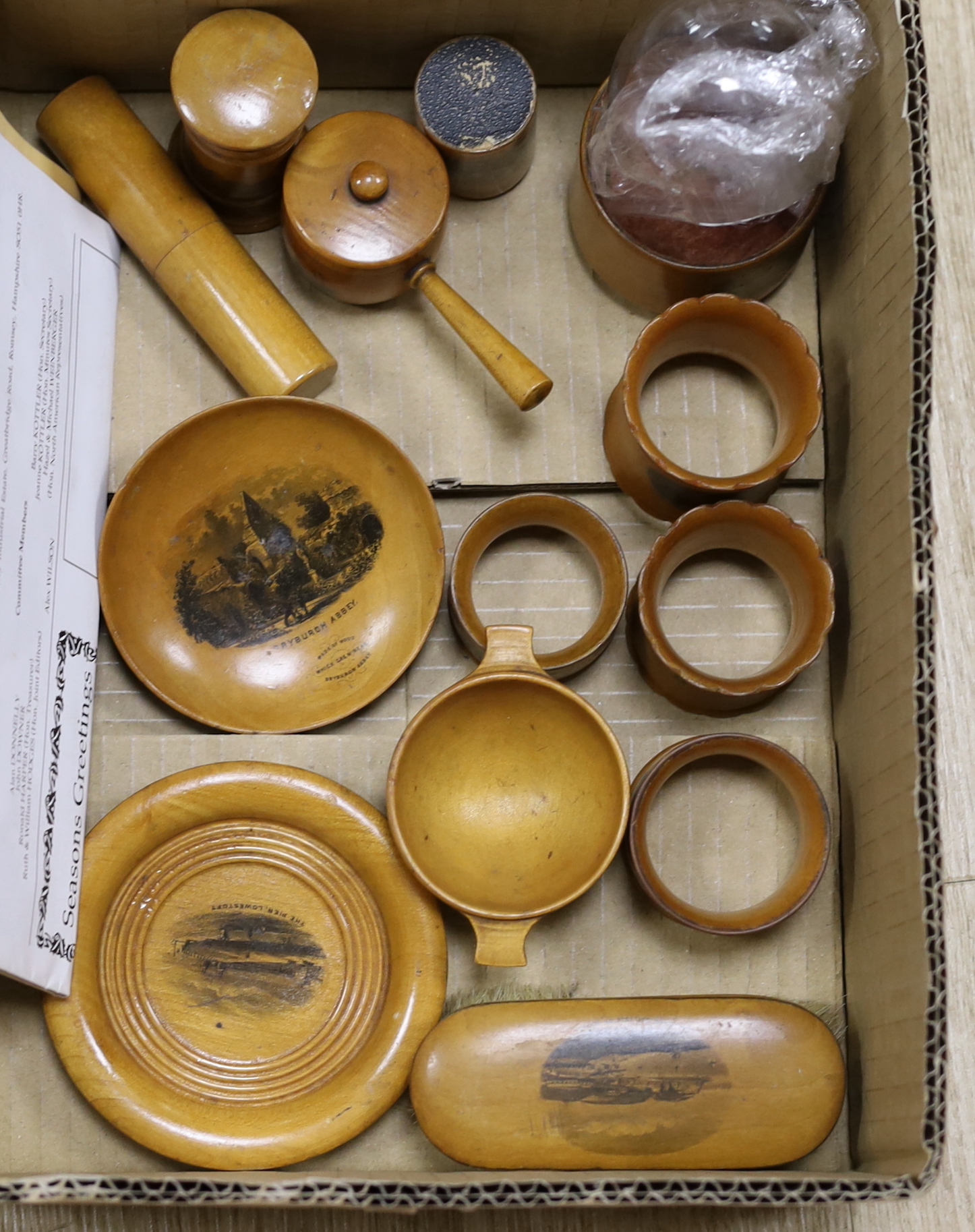 A collection of mixed Mauchline wares Including napkin rings and miniature boxes